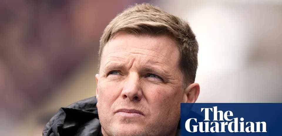 Football manager looking thoughtfully during a match