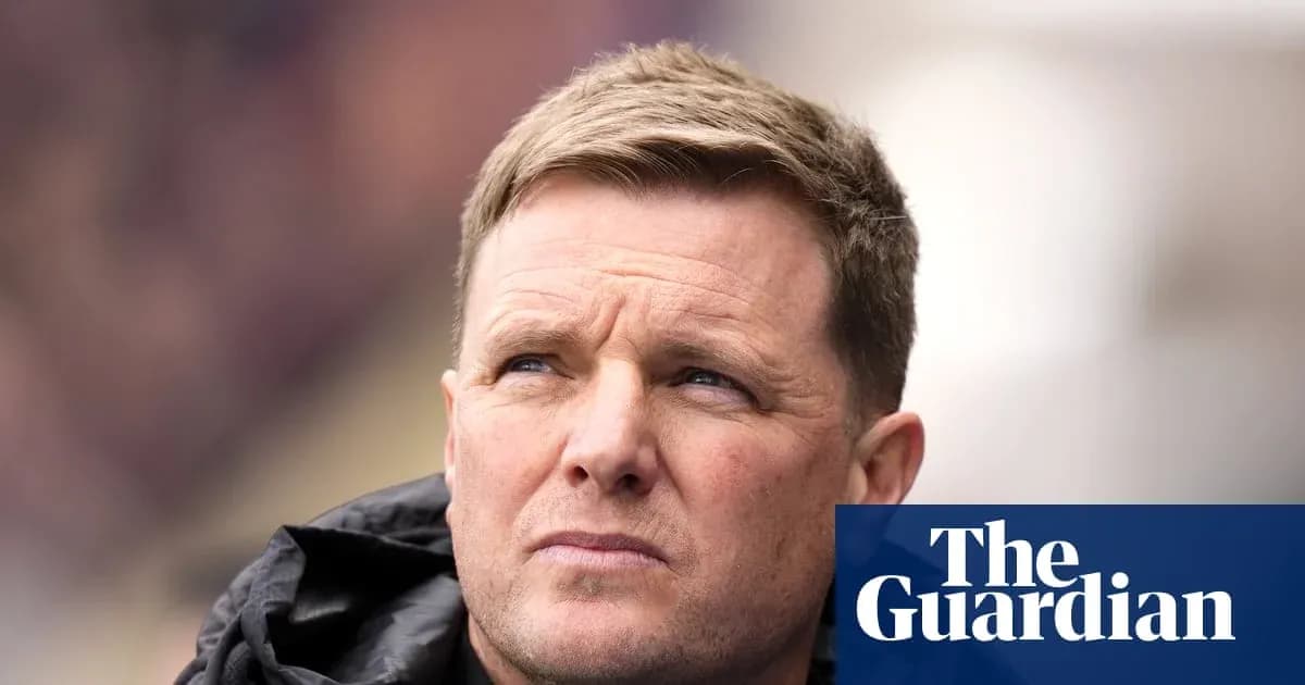 Football manager looking thoughtfully during a match
