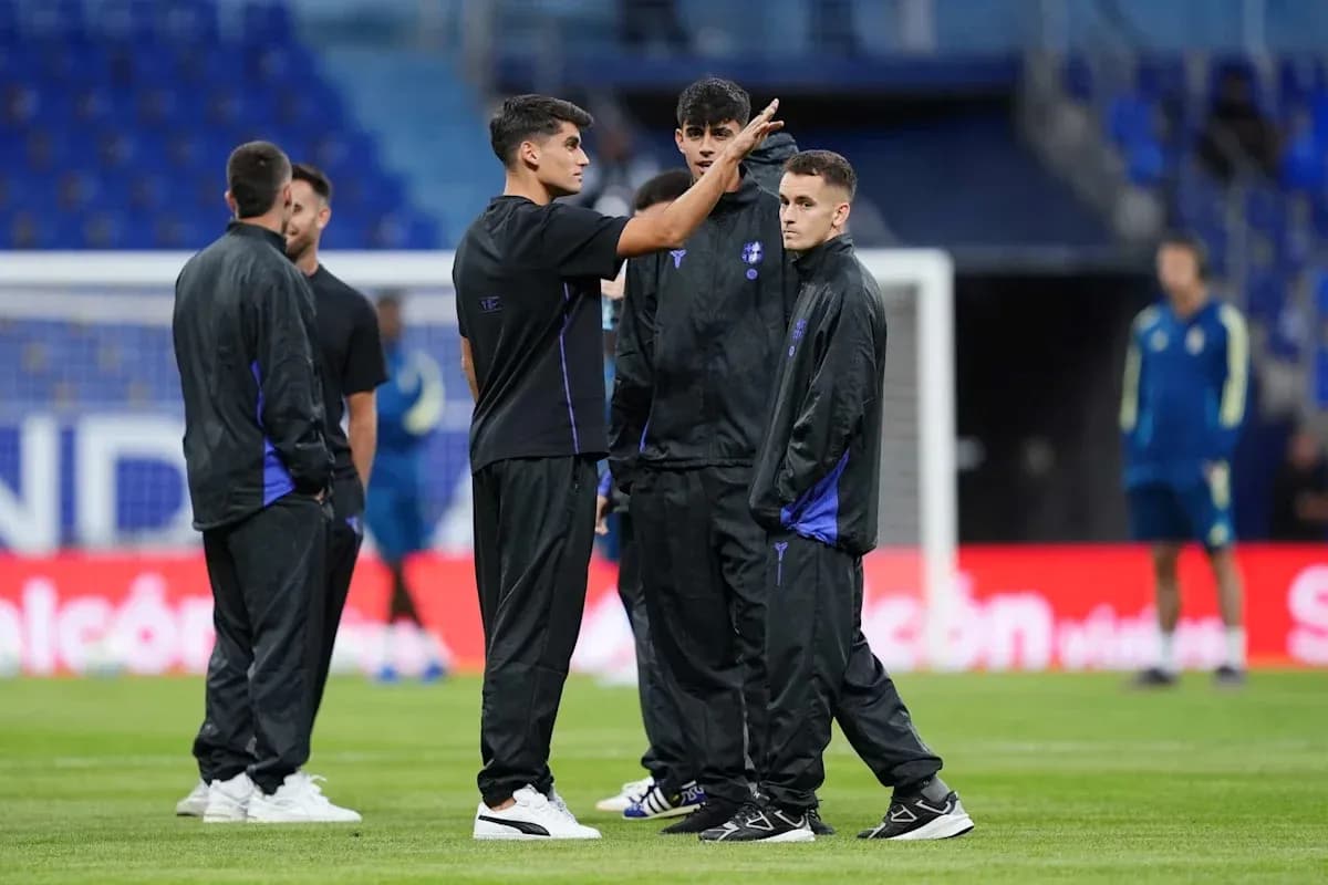 Players discussing during pre-match warm-up session