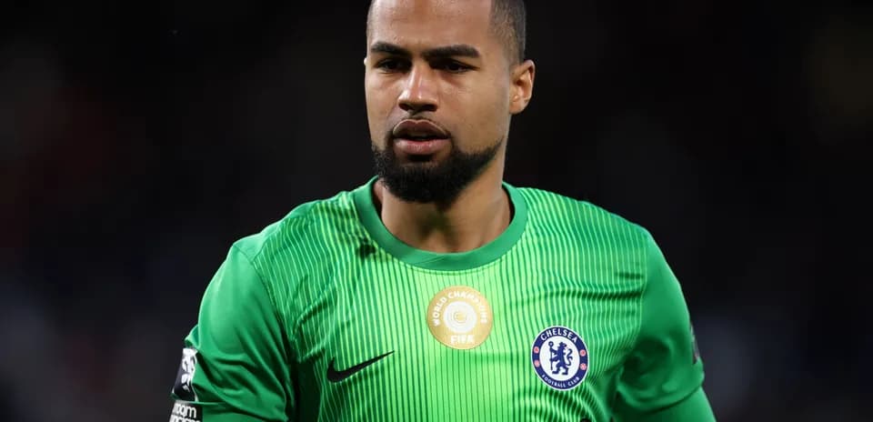Goalkeeper wearing green kit during match