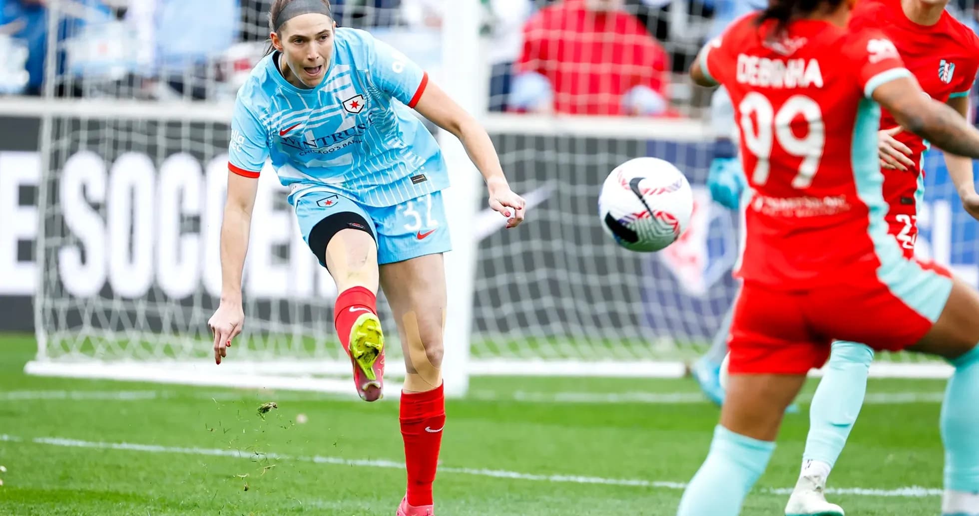 Chicago Red Stars player kicking the ball