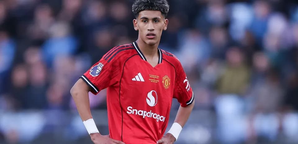 Player in red Manchester United kit during match