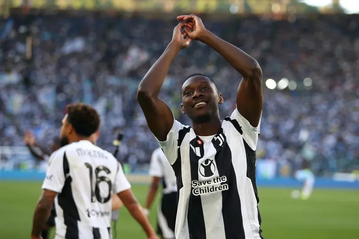 Player celebrating with fans after match victory