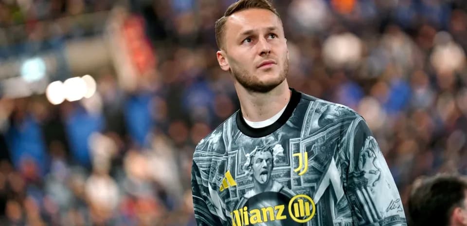 Goalkeeper in Juventus kit during match warm-up