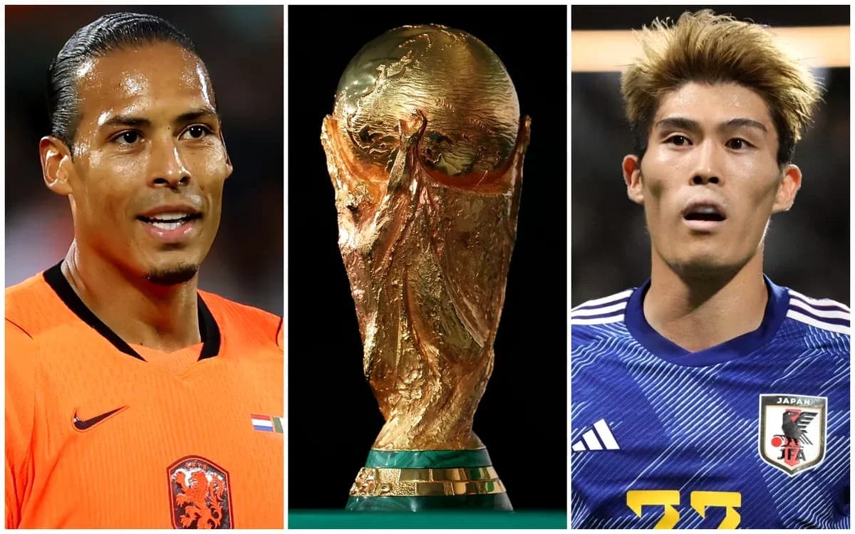 Virgil van Dijk and Japanese player with World Cup trophy