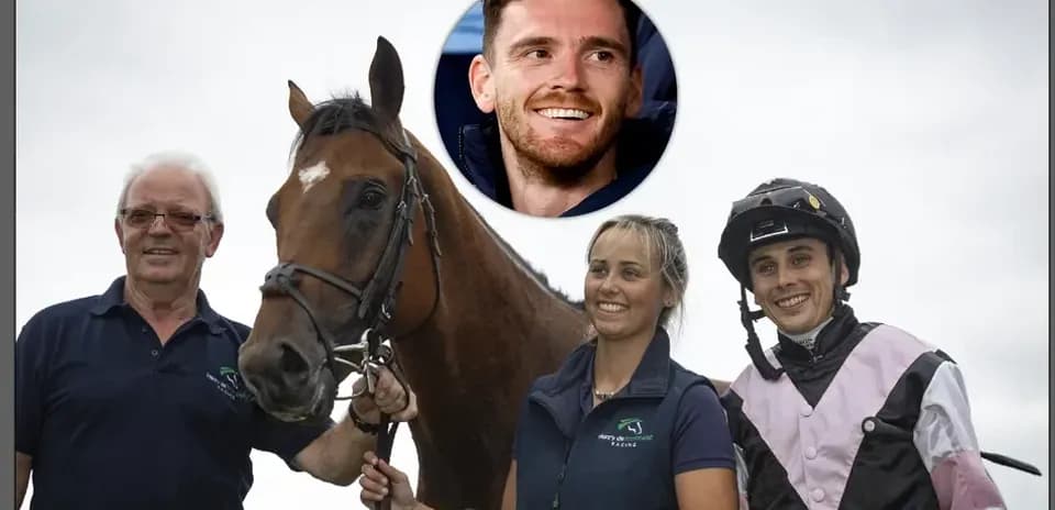 Team posing with horse at racing event