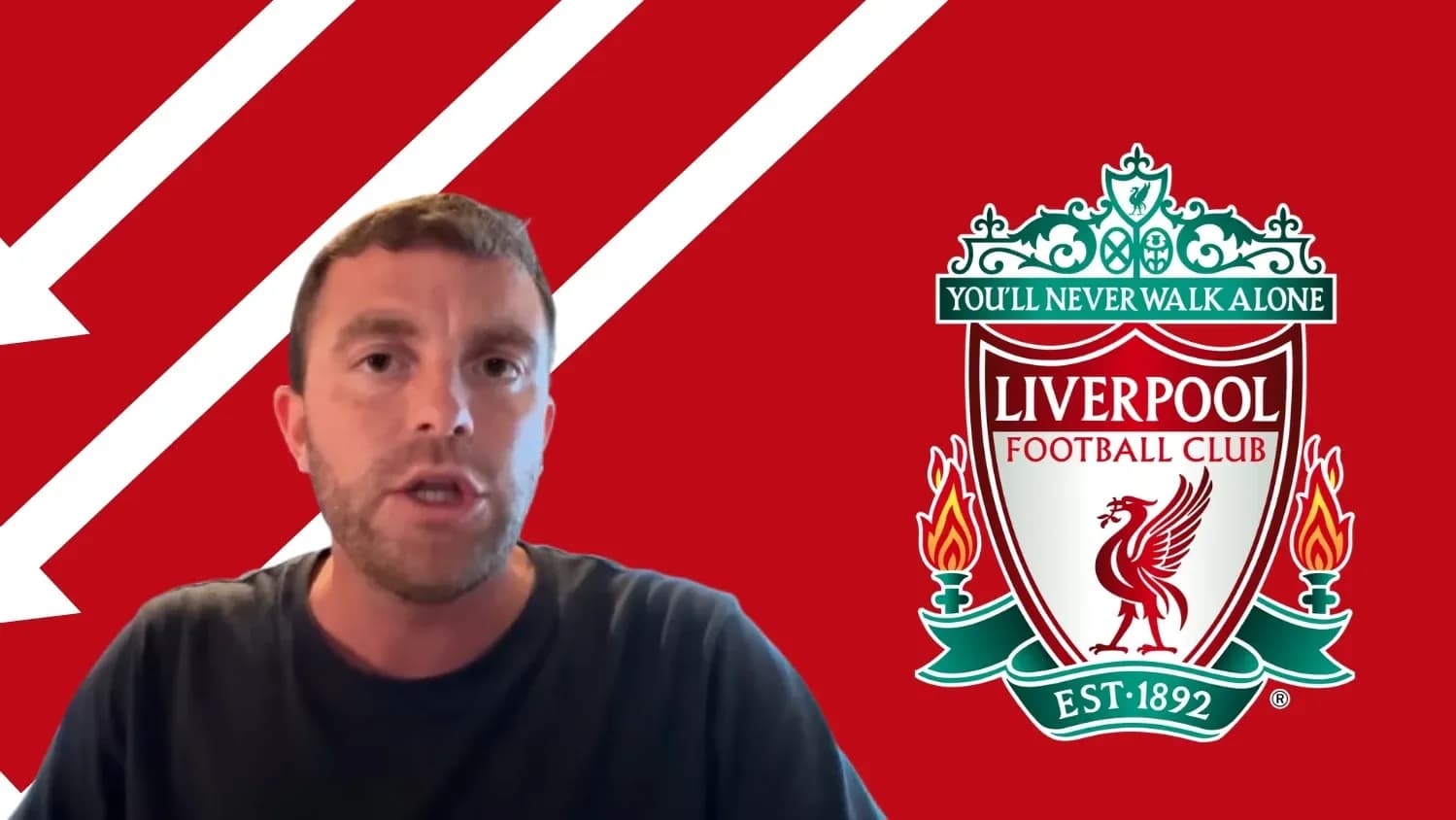 Person speaking with Liverpool FC logo in background