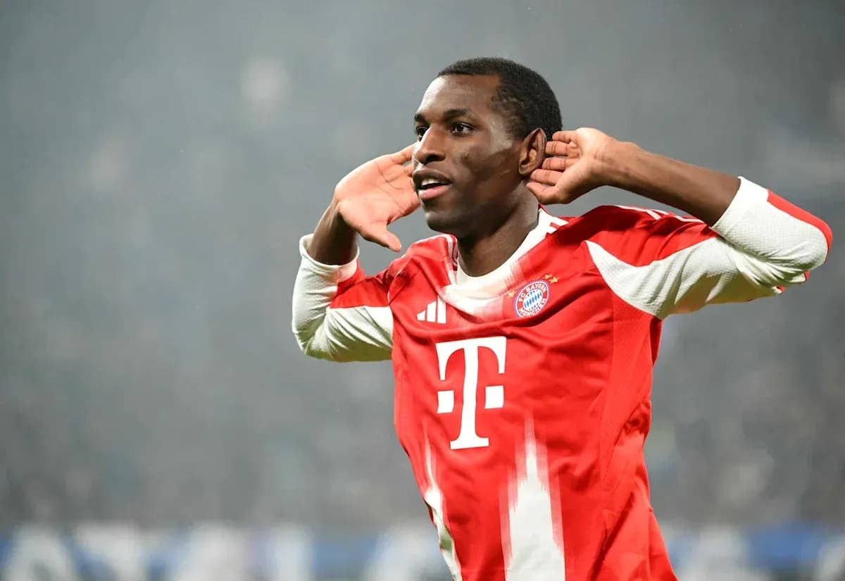Player celebrating a goal with hands to ears
