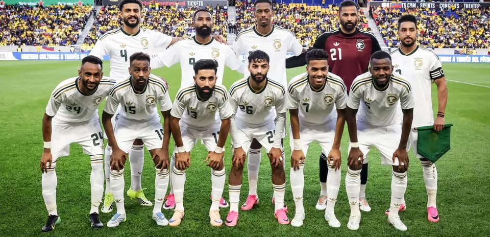 Saudi Arabian football team posing for a group photo