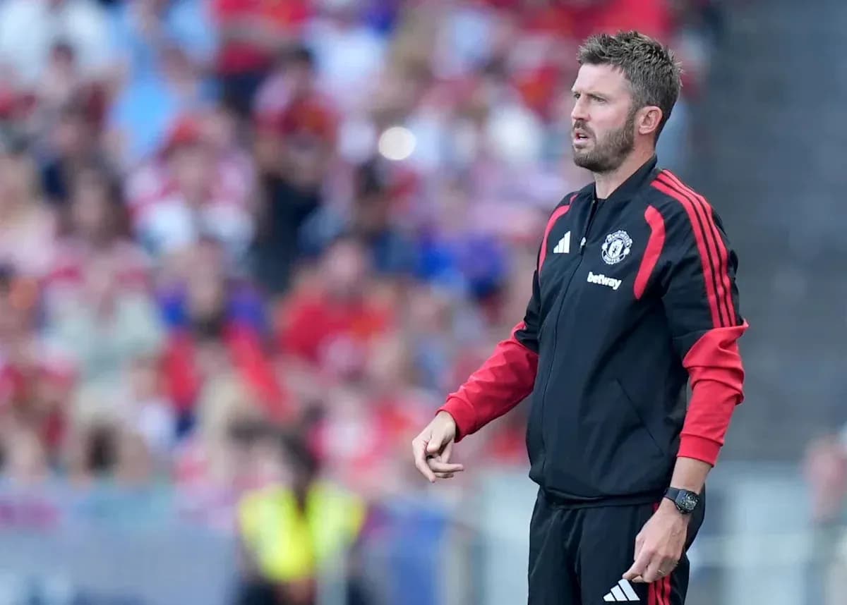 Coach on sidelines during football match