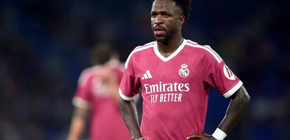 Player in pink Real Madrid kit during match