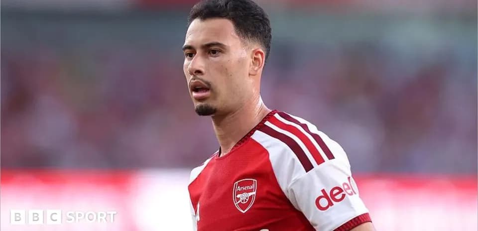 Player wearing Arsenal jersey during match
