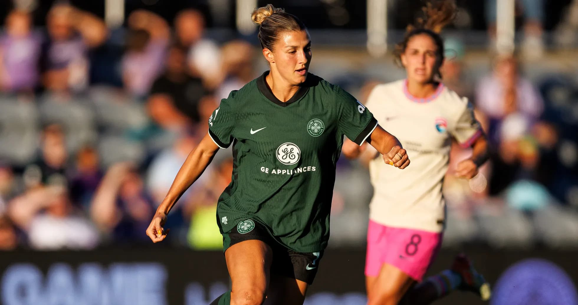 Player from Racing Louisville dribbling the ball