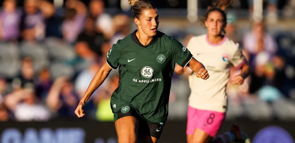 Player from Racing Louisville dribbling the ball