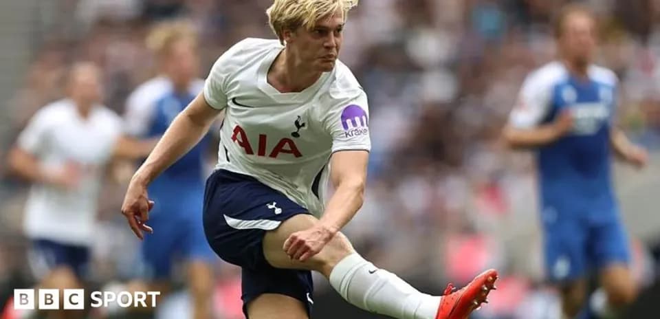 Player kicking the ball during a match