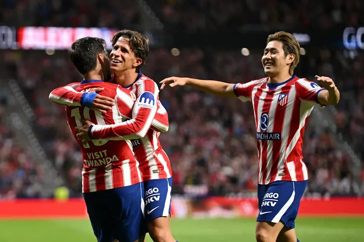 Atletico Madrid players celebrating a goal together