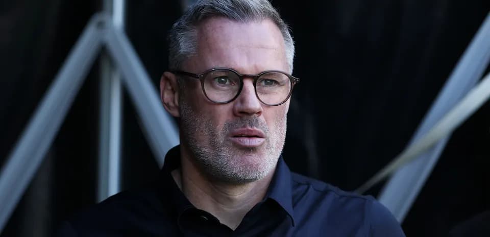 Man with glasses looking thoughtfully at event
