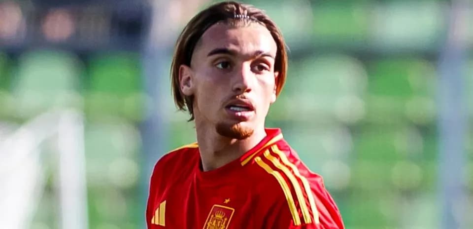 Player in red Spain jersey during training session