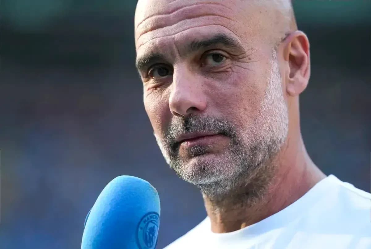 Coach speaking into microphone during interview