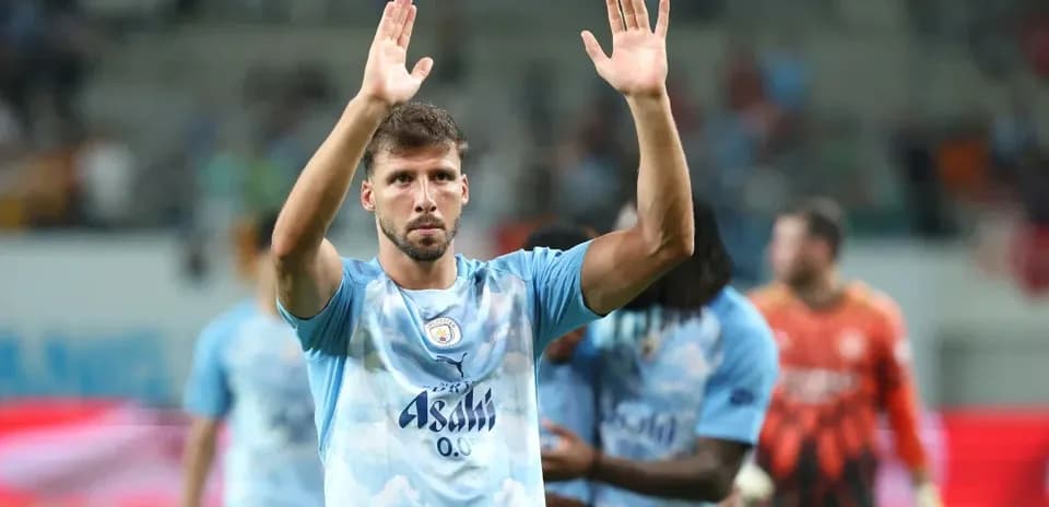 Player applauding fans after the match