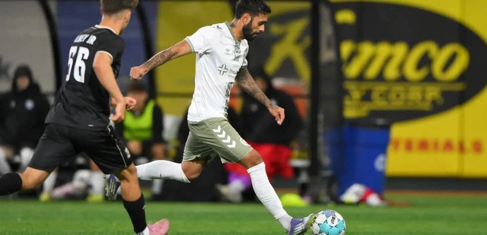 Player dribbling the ball during USL match
