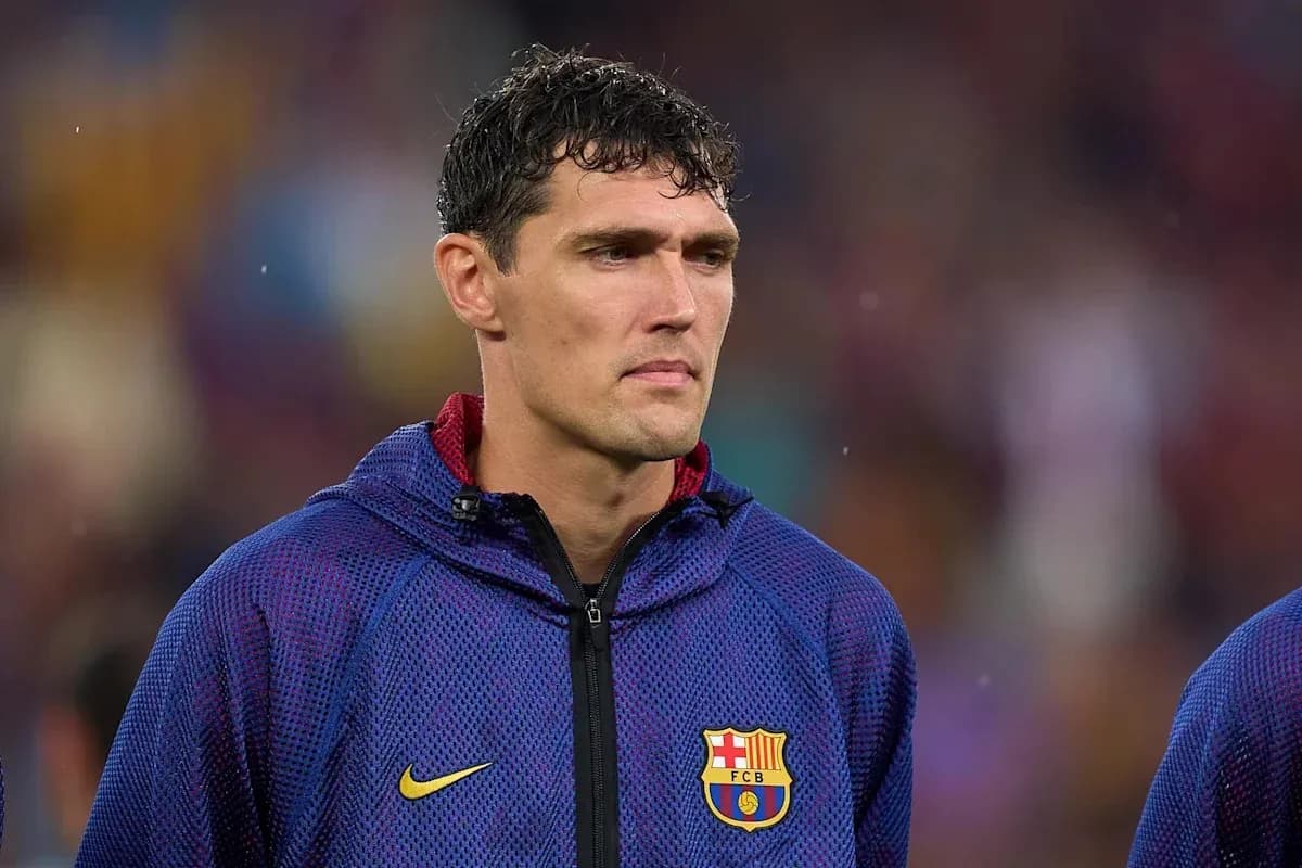 Player in Barcelona jacket during match warm-up