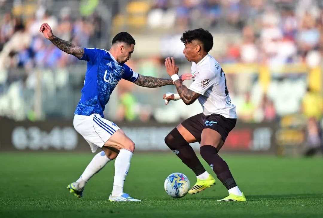 Players contesting for the ball during Serie A match