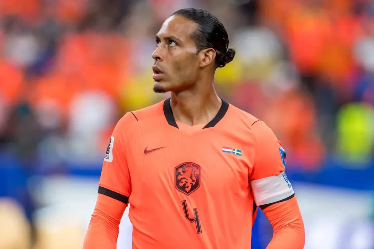 Player in orange jersey looking up during match