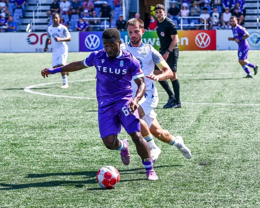 Player dribbling the ball during Pacific FC match Player dribbling the ball during Pacific FC match