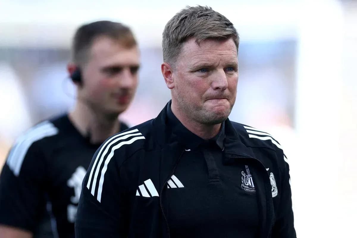 Manager walking off the pitch after match