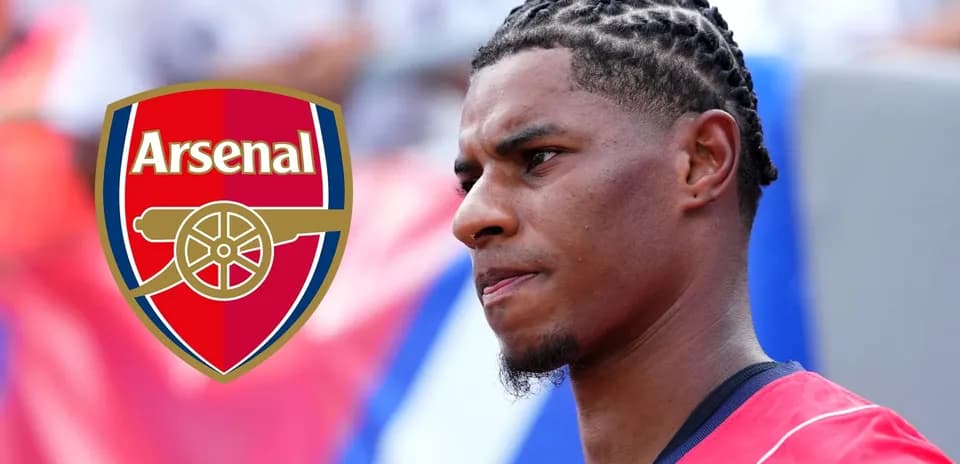 Player in red jersey with Arsenal logo in background