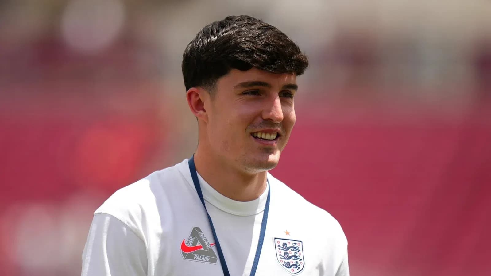 Player smiling on field before match