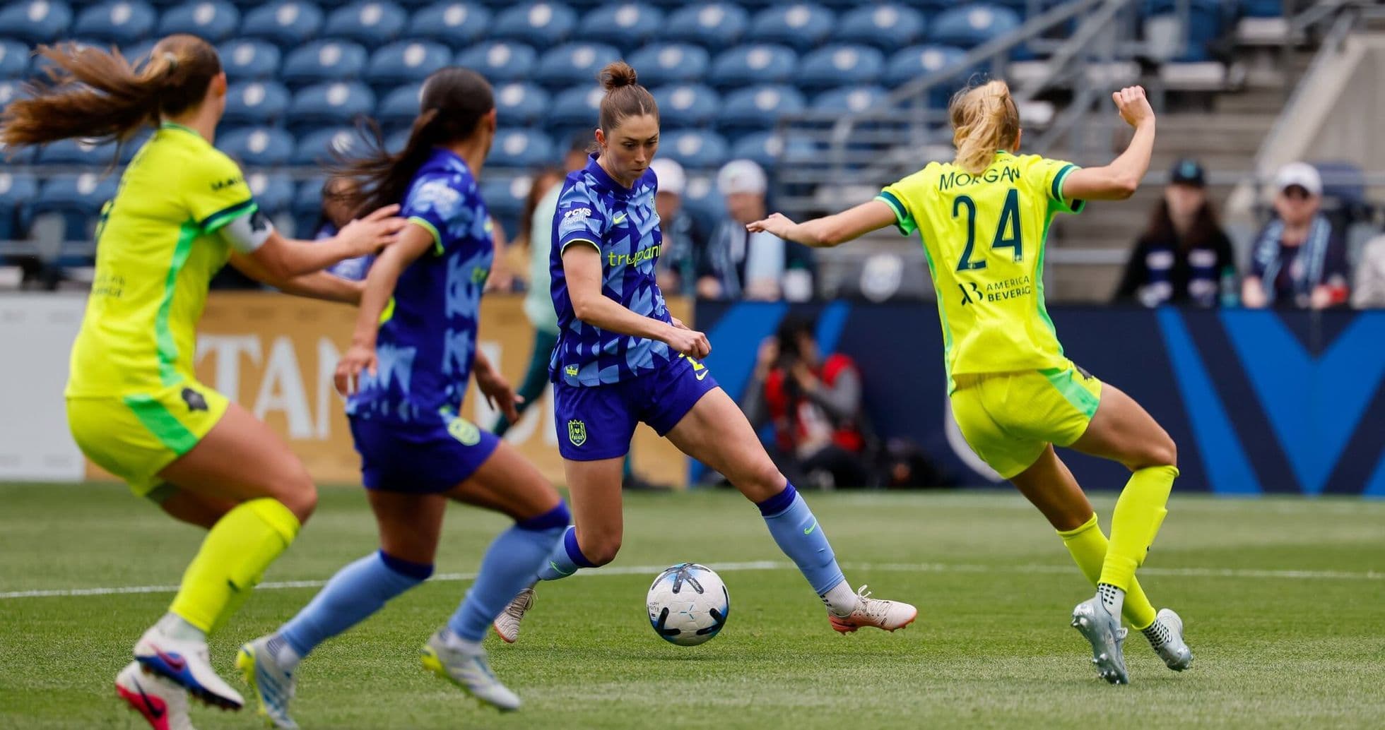 Players competing for the ball during match
