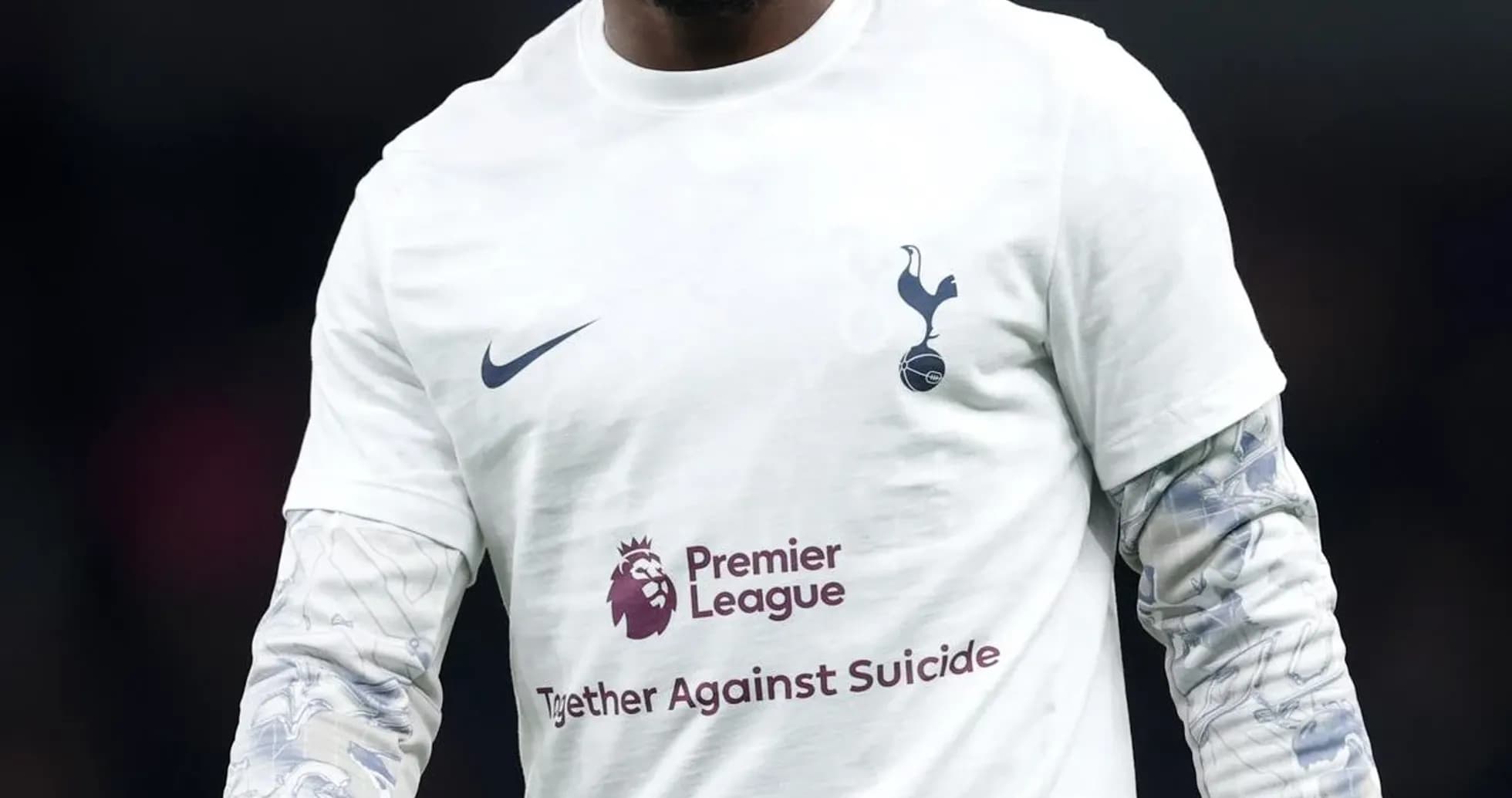 Player warming up in Tottenham jersey before match