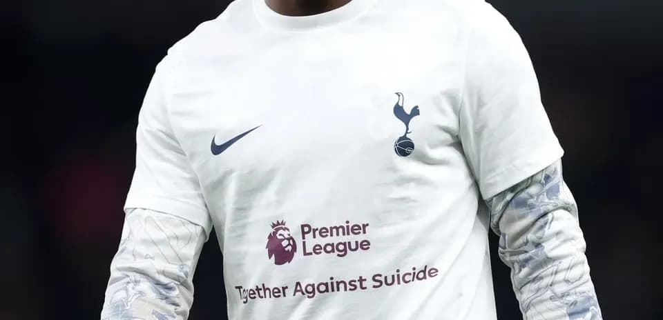 Player warming up in Tottenham jersey before match