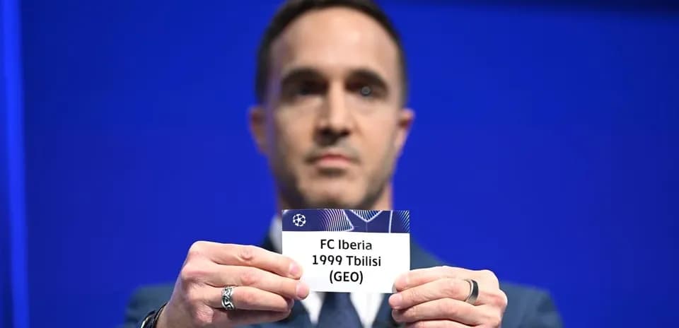 Official holding FC Iberia Tbilisi name card