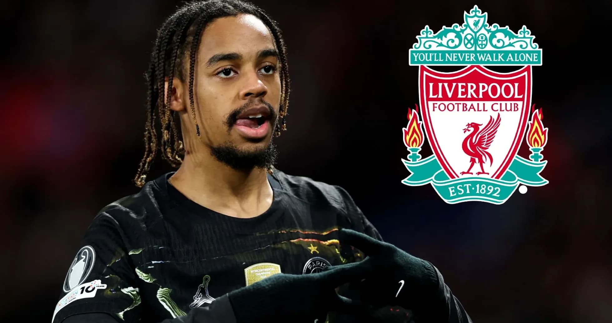 Player gesturing with Liverpool logo in background