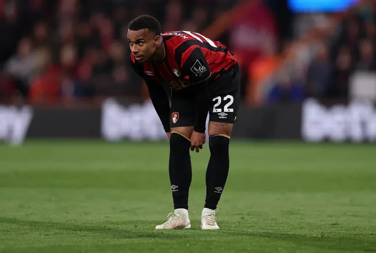 Bournemouth player bending forward on the pitch