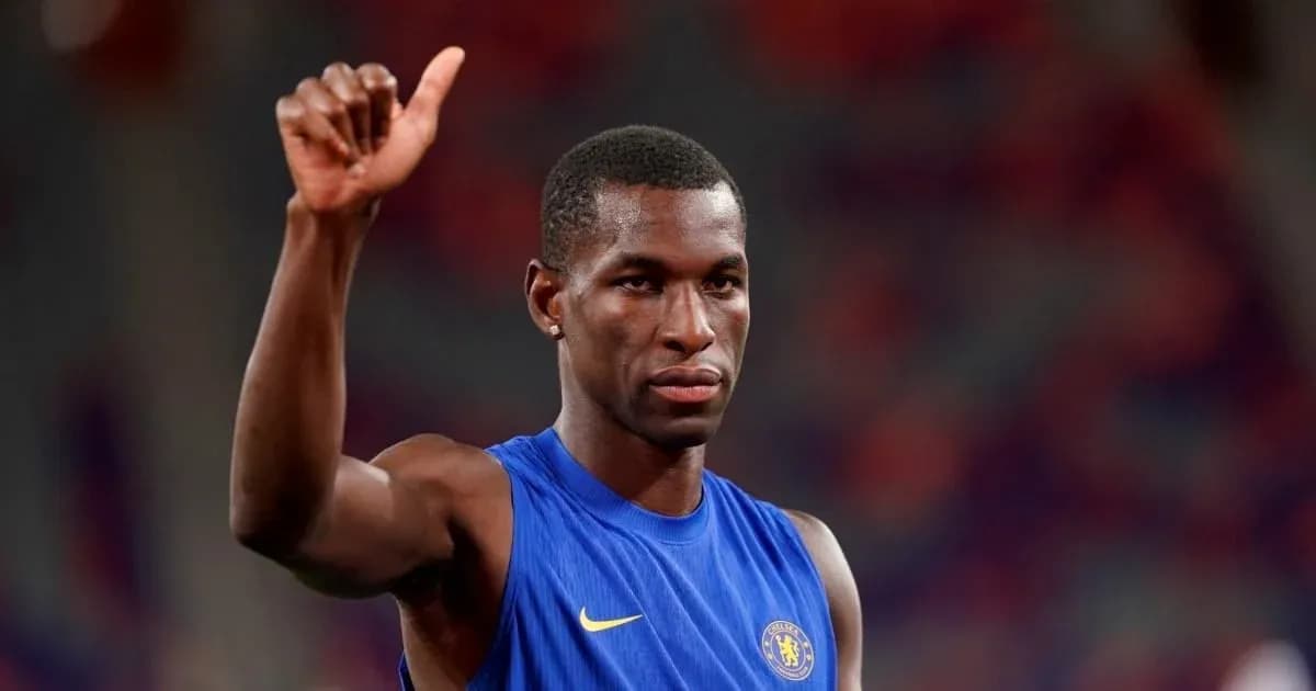 Player in blue jersey giving a thumbs up