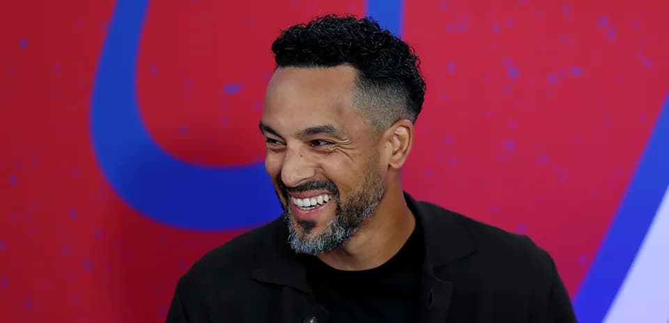 Man smiling during an interview session