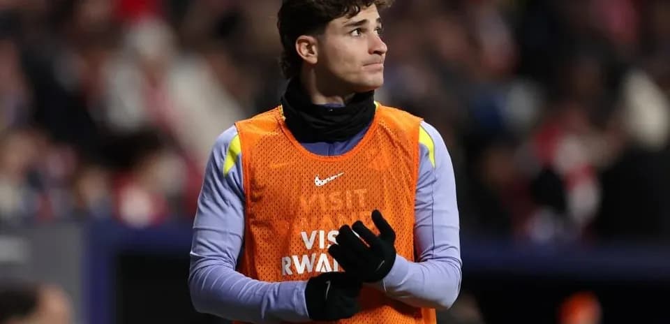Player in training gear during match warm-up