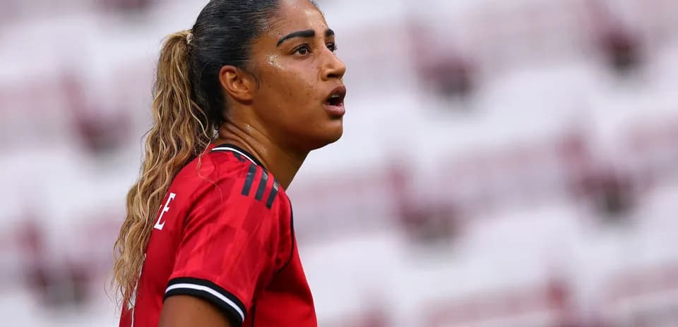 Player in red jersey during a match