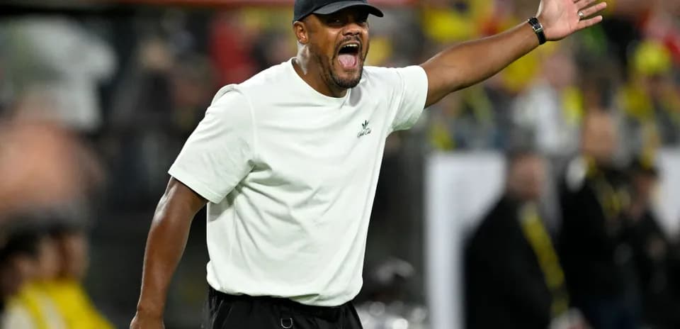 Coach gesturing and shouting during a match