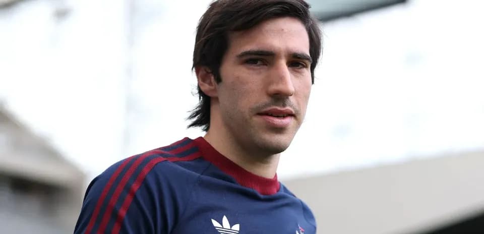 Player in training kit at stadium entrance