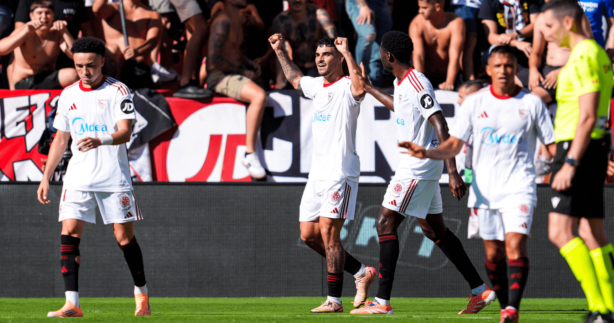 Players celebrating a goal during La Liga match