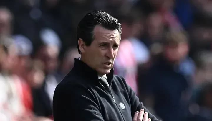 Manager observing match from the sidelines