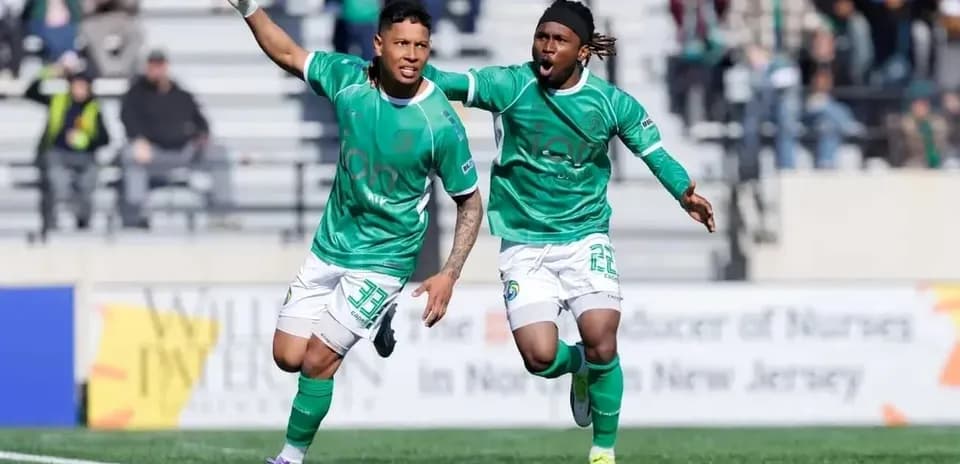 Players celebrating a goal during Cosmos match