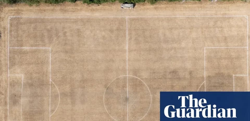 Aerial view of a dry, marked soccer field