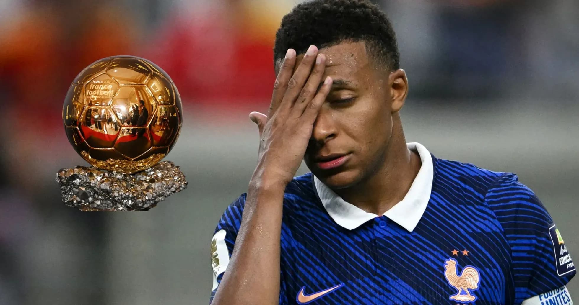 Player reacting next to a Ballon d'Or trophy