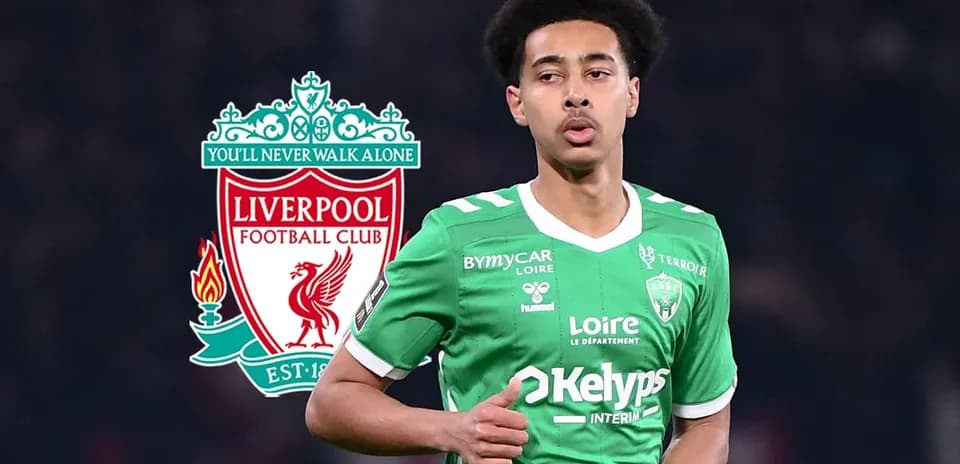 Player in green jersey with Liverpool logo in background